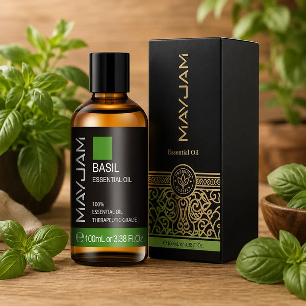 Bazsalikom illóolaj 100 ml fekete díszdobozzal és borostyánszínű üvegben, natúr fa asztalon elhelyezve