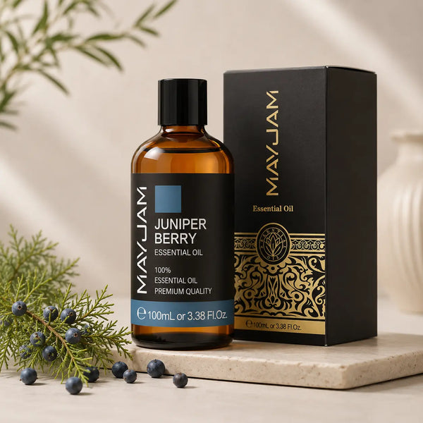 Borókabogyó illóolaj 100 ml-es borostyánszínű üvegben fekete díszdoboz mellett