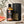Load image into Gallery viewer, 100 ml-es grapefruit illóolaj borostyánszínű üvegben fekete kupakkal és fekete prémium díszdobozzal
