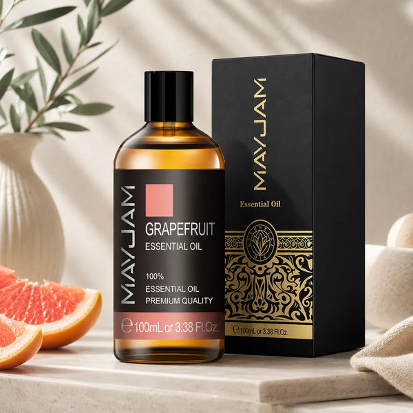 100 ml-es grapefruit illóolaj borostyánszínű üvegben fekete kupakkal és fekete prémium díszdobozzal